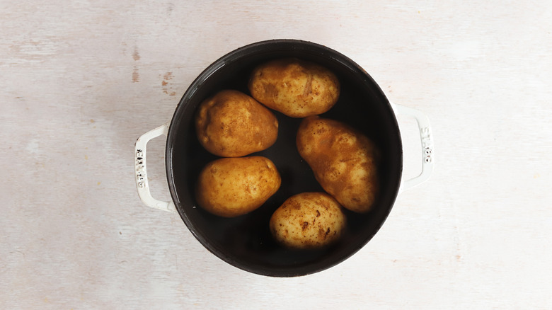 potatoes in a pot of water