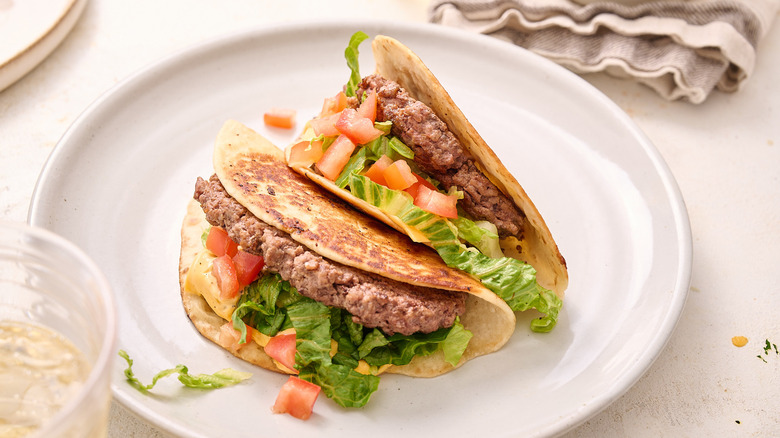 smash burger tacos on plate