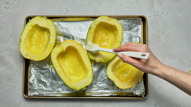 brushing squash with oil