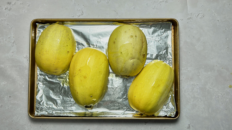 spaghetti squash on a sheet tray