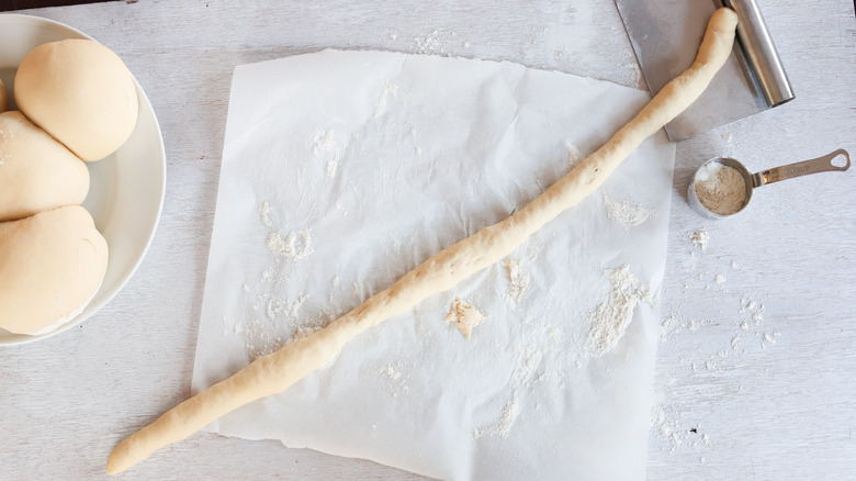 pretzel dough rolled into a log