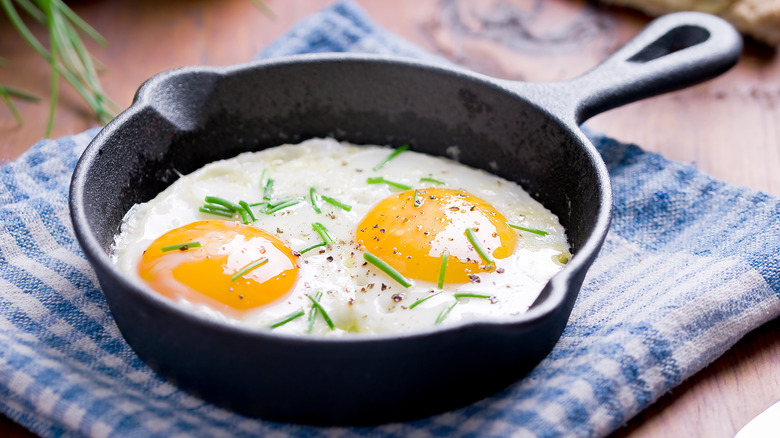 Fried eggs in a cast iron pan 