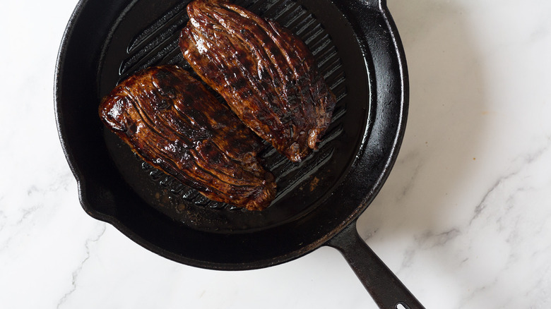 Cooked steak in pan