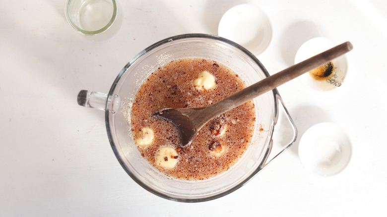 cinnamon mixed with milk in a bowl