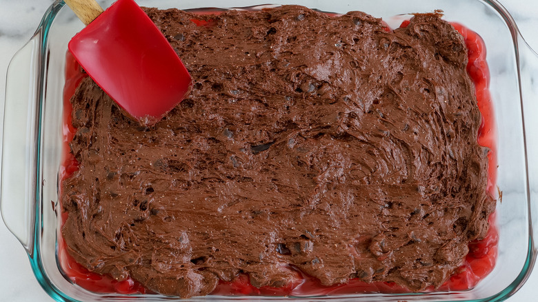 cake batter spread out in pan