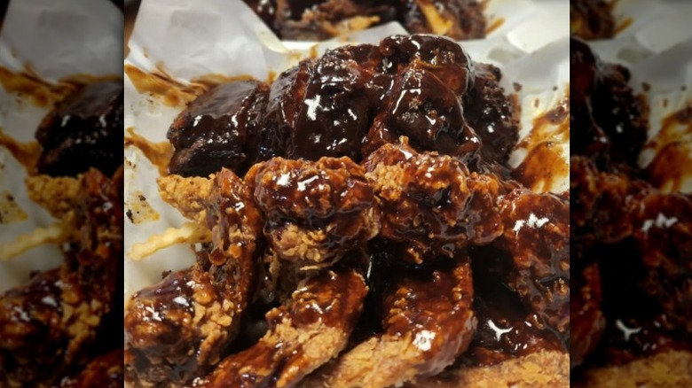 saucy fried chicken and fries