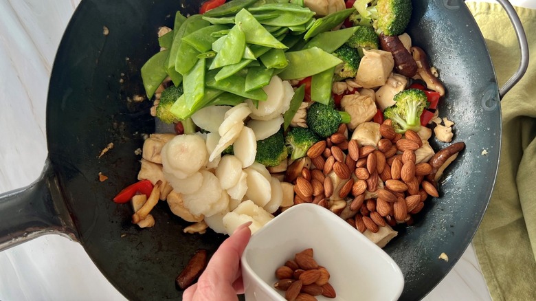 making chicken almond gai ding stir-fry