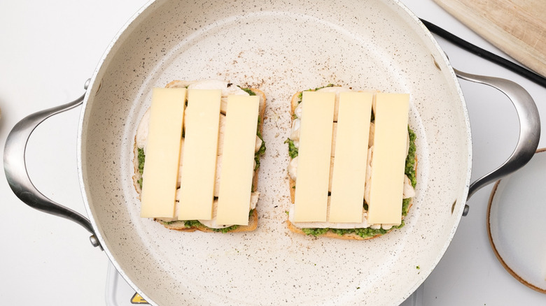 assembling sandwich in a pan