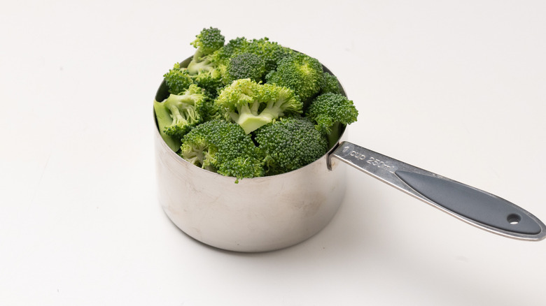 broccoli in a measuring cup