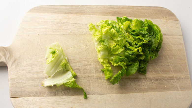 sliced lettuce on wooden board