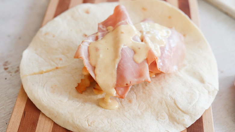 assembled french tacos on cutting board