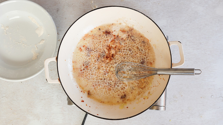 butter and flour in a frying pan