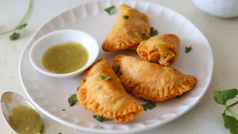 empanadas on white plate