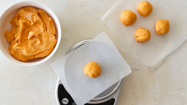 empanada dough ball on scale