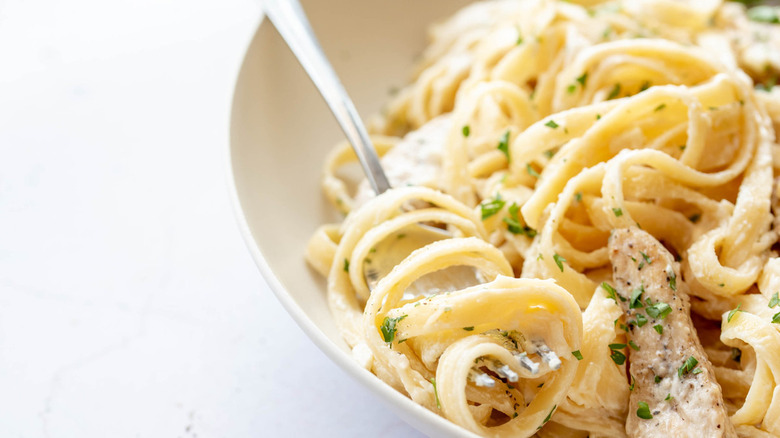 pasta in bowl with fork