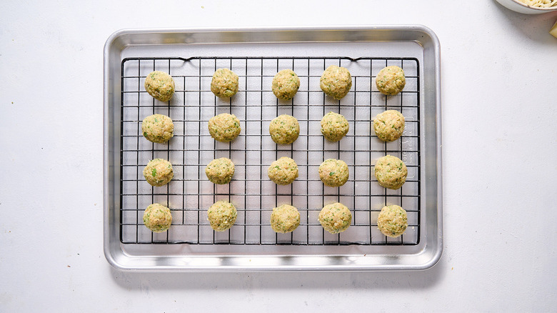 meatballs arranged on sheet tray