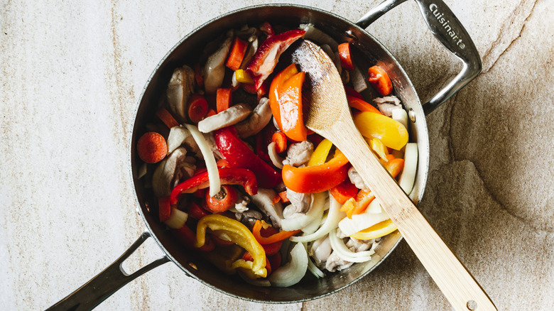 cooking chicken and peppers