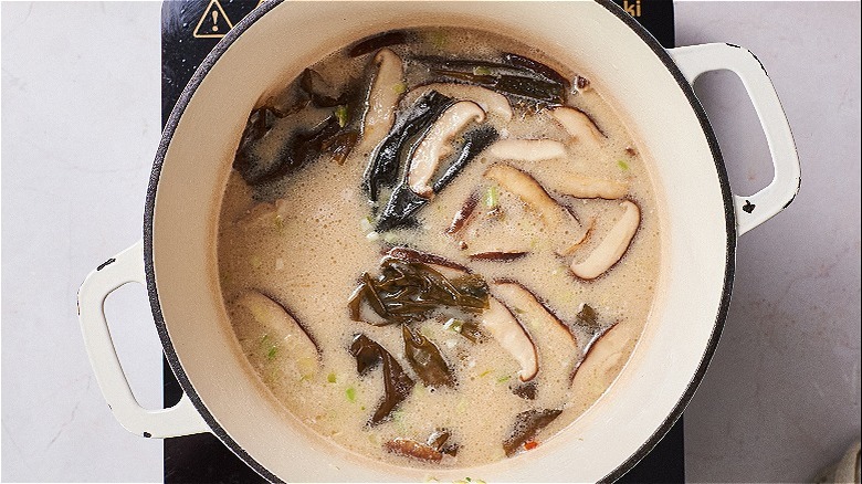 simmering broth in a pot