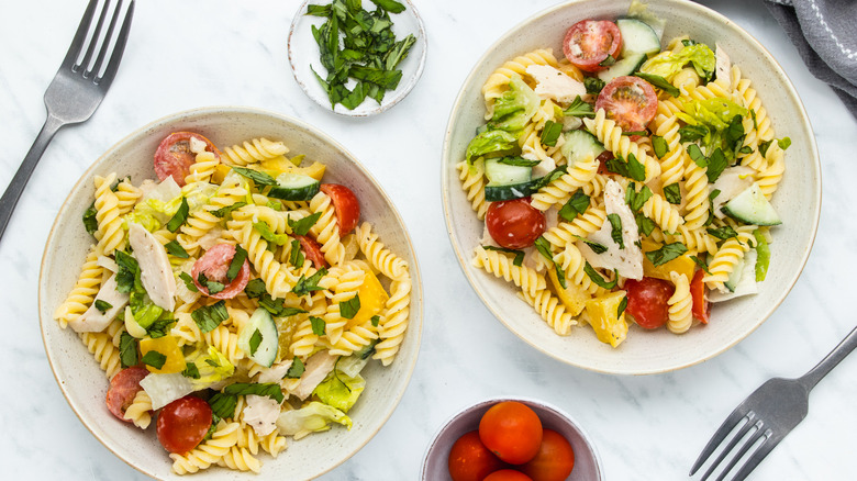 chicken pasta salad in bowls 