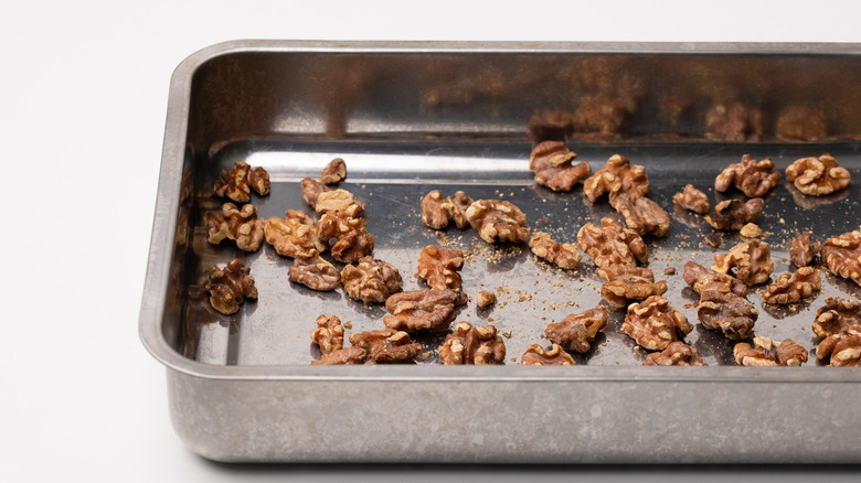 toasted walnuts in a tray