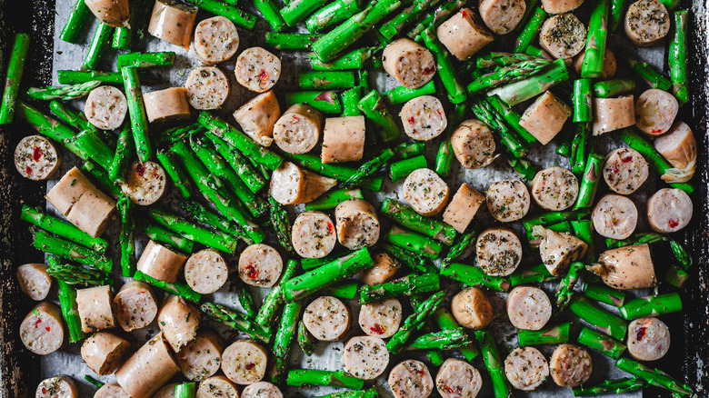 sausage and asparagus on pan