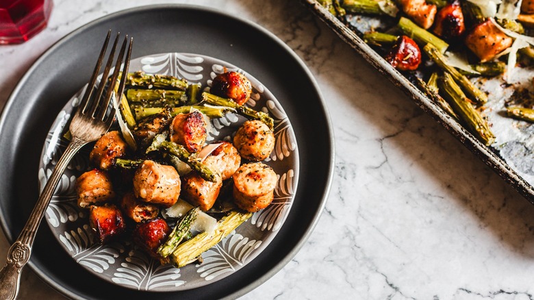 chicken sausage and vegetables on plate