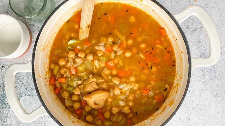 chickpea orzo soup in dutch oven