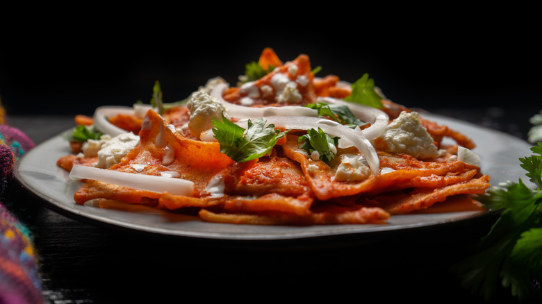 chilaquiles rojos with onions