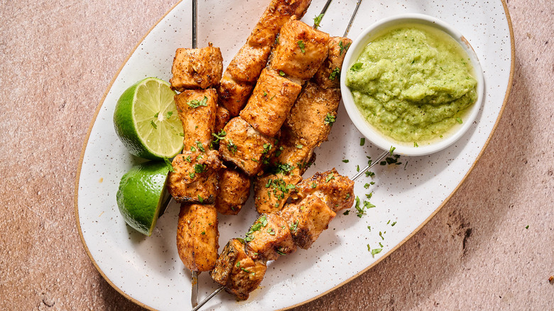 salmon skewers on a plate