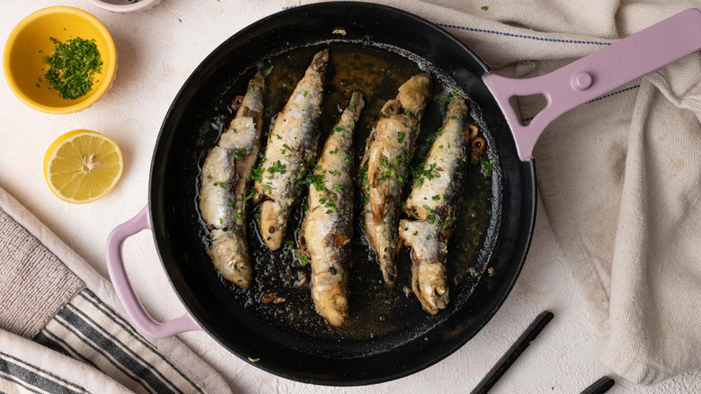 cooked fish in skillet 