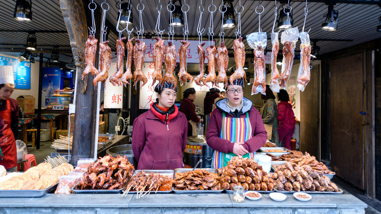 sichuan street vendor selling meat