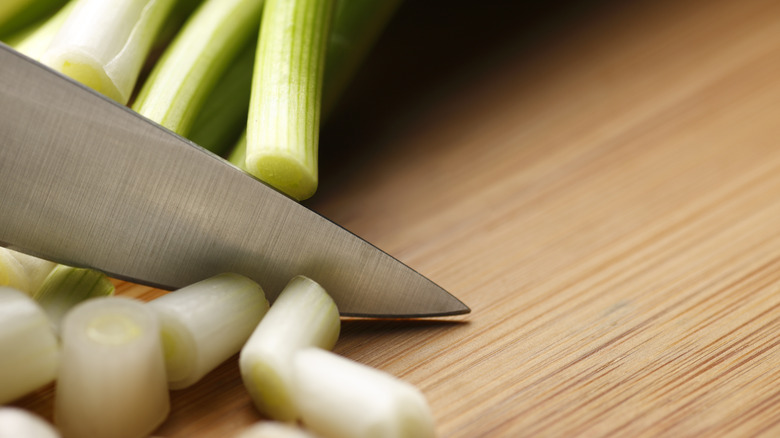 chopping scallions