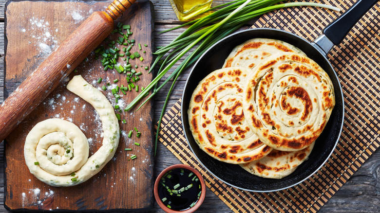 Chinese scallion pancakes cooked and raw