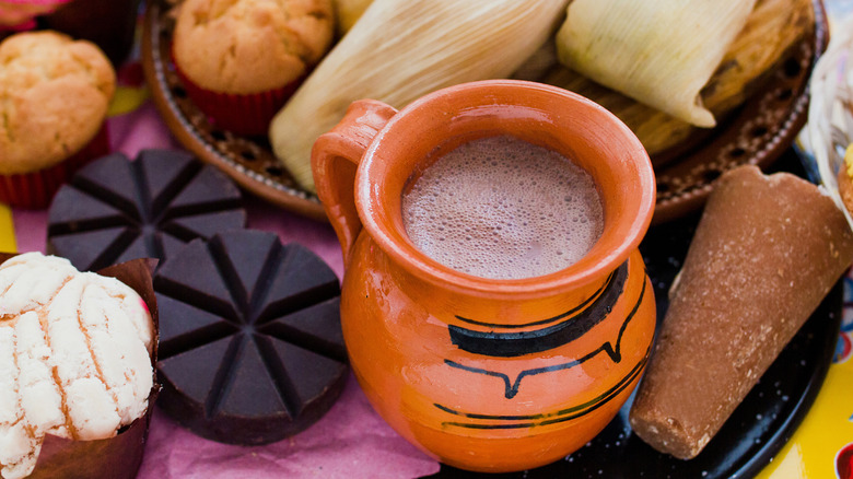 chocolate-atole displayed with traditional Mexican foods