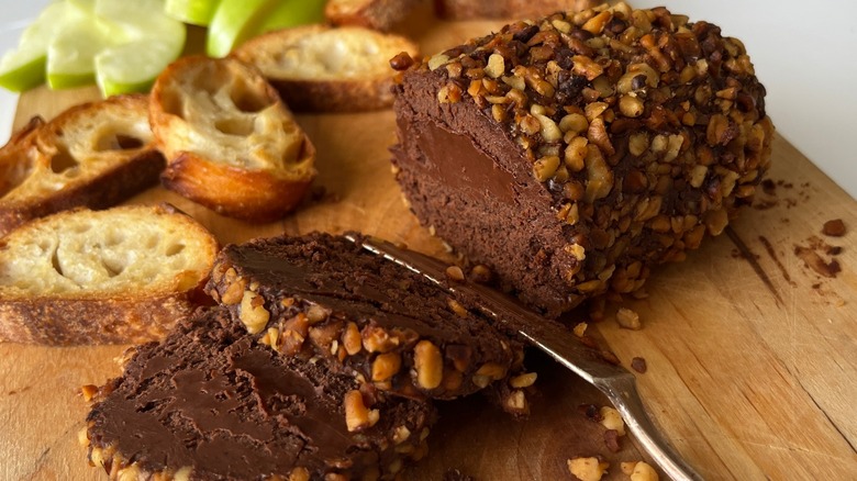 chocolate cheese fudge on wood board with baguette slices