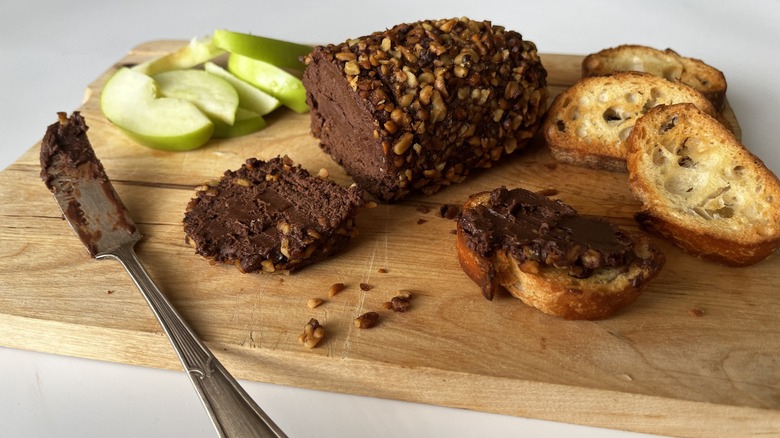 sliced chocolate cheese fudge on cheese board