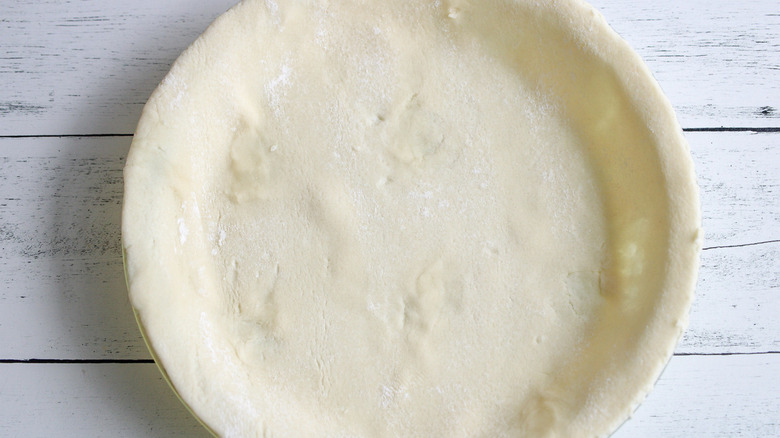 unbaked pie crust in pan