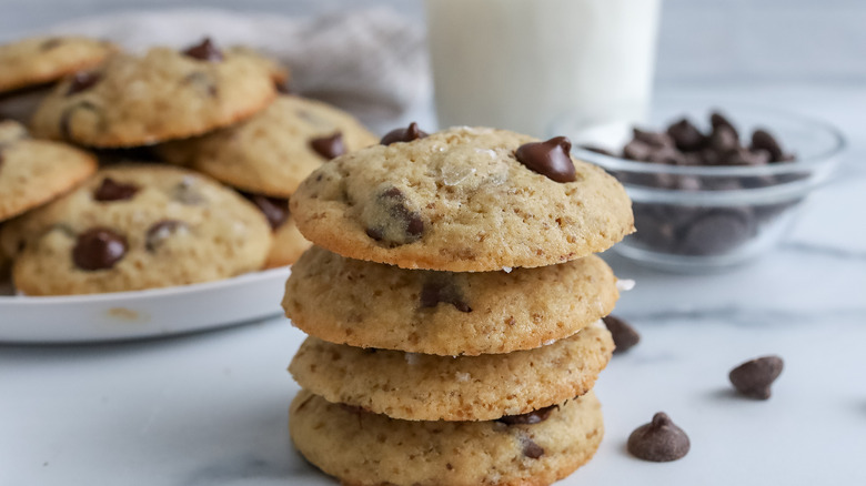 Four cookies stacked on a table 