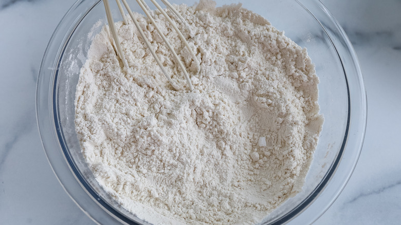 dry ingredients in a bowl with a whisk