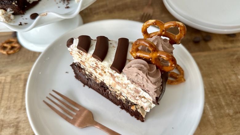Slice of chocolate-covered pretzel ice cream cake