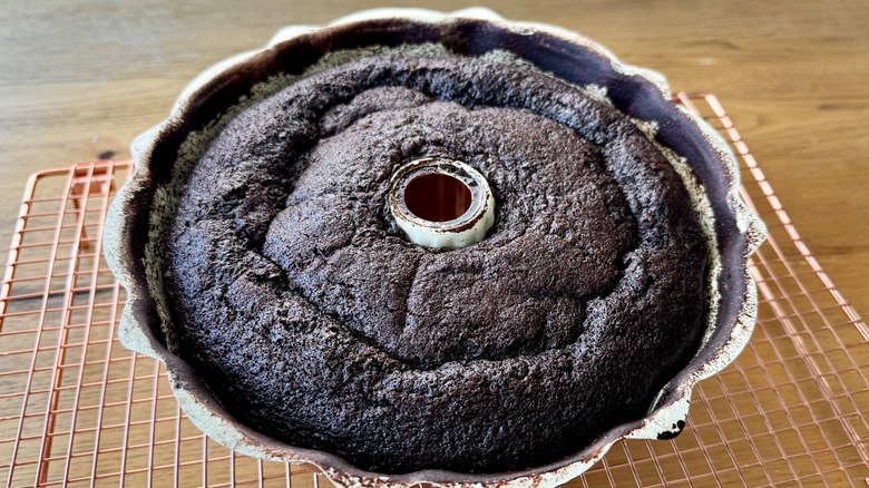 Baked chocolate bundt cake on wire rack