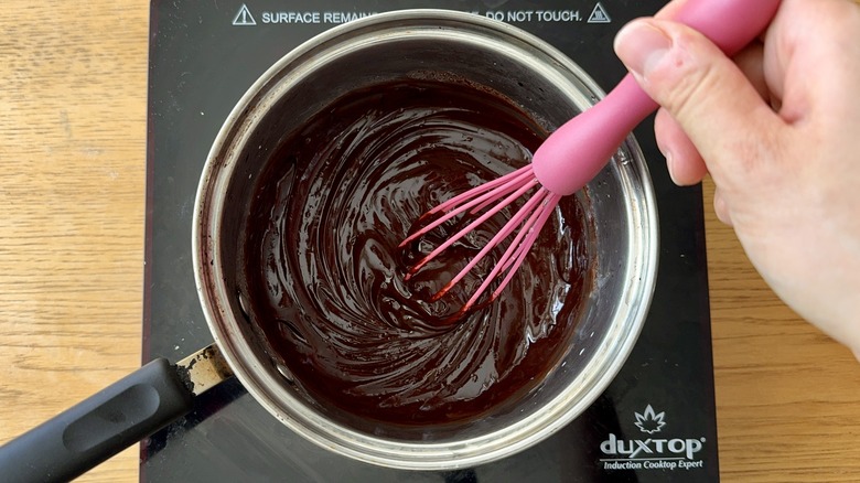 Whisking chocolate glaze