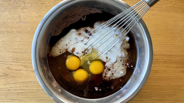 Whisking chocolate cake batter