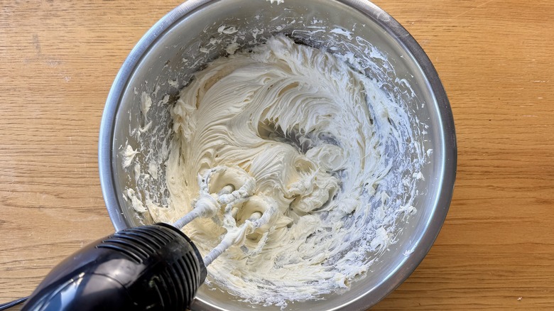 Mixing cream cheese filling