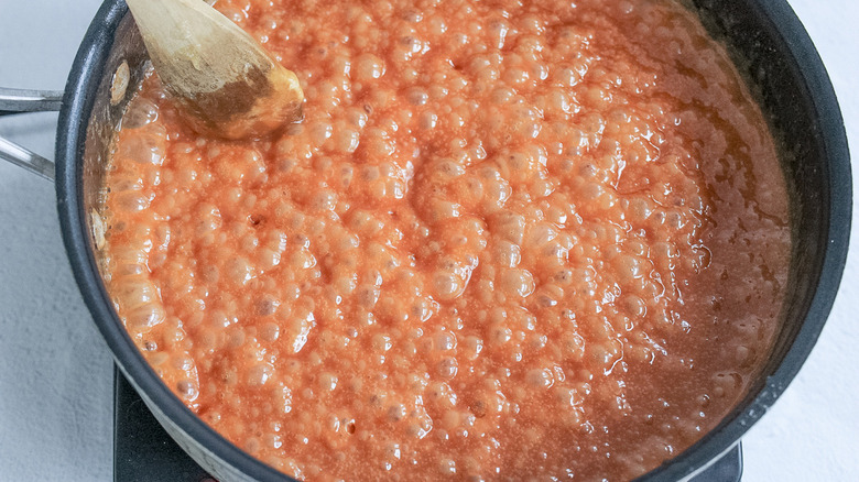 bubbling caramel sauce in pan