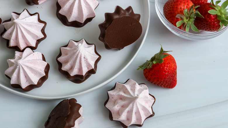 chocolate strawberry meringue cookies on a plate