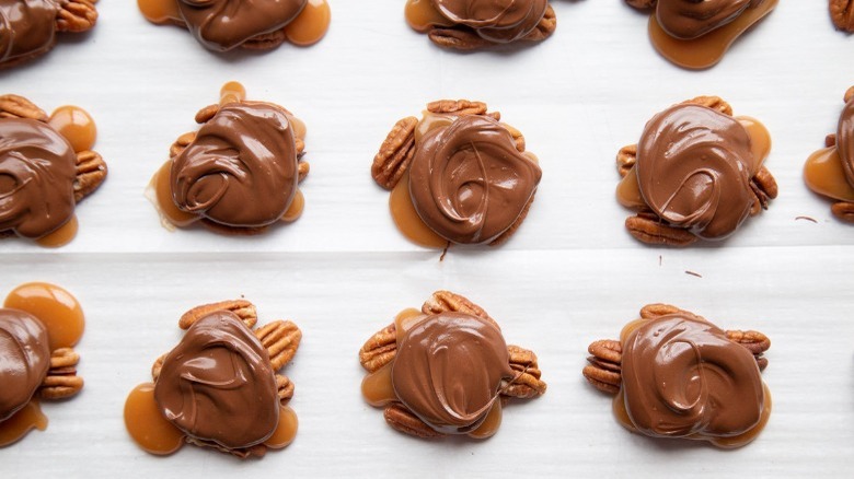 chocolate turtles on parchment paper