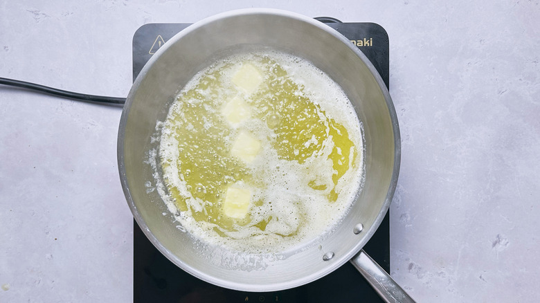 melting butter in a skillet