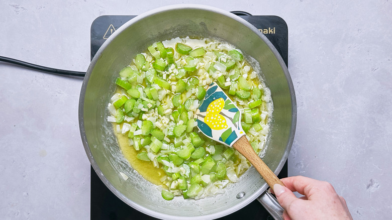 cooking vegetables in skillet