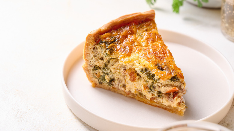 slice of quiche on plate